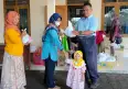 Pemberian PMT Bumil KEK dan PMT Balita Gizi Kurang Kalurahan Srimulyo